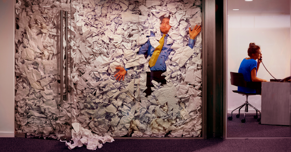 Drowning in paper work.